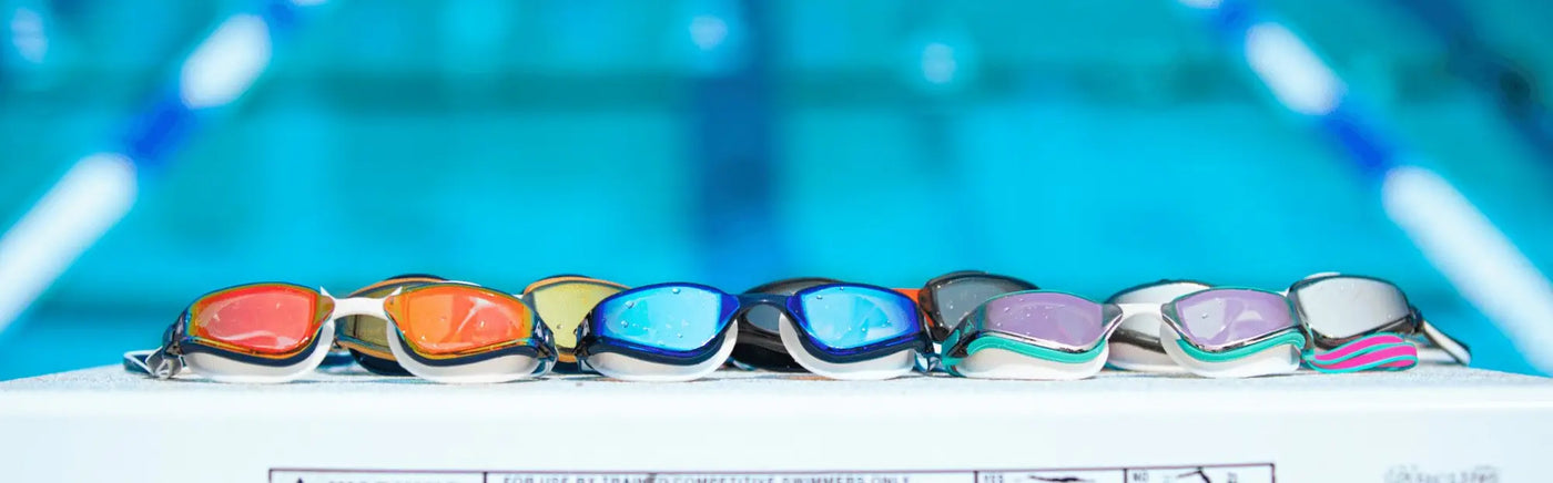 Colorful Aqua Sphere swim goggles with clear lenses in swimming goggle range