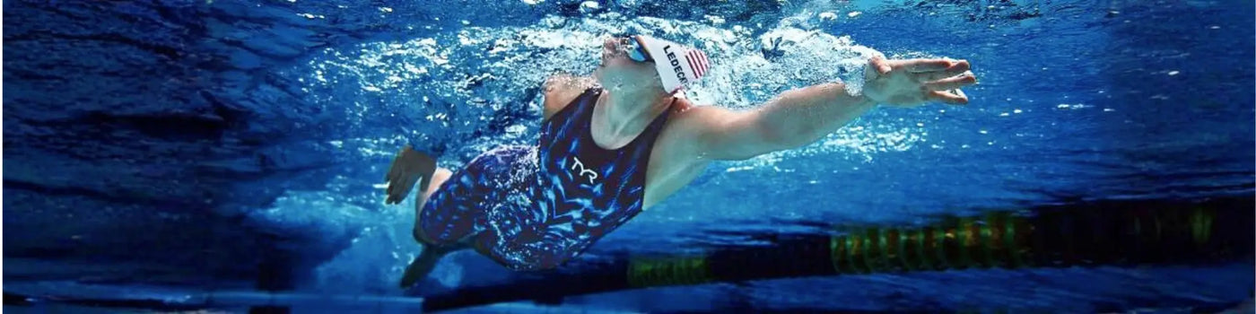 TYR blue and white swim trunks with black trim for triathlete swimmers